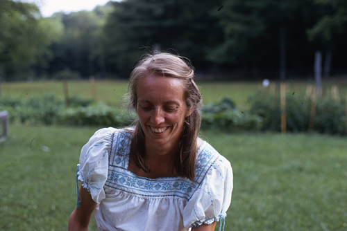 Claire with garden in background.